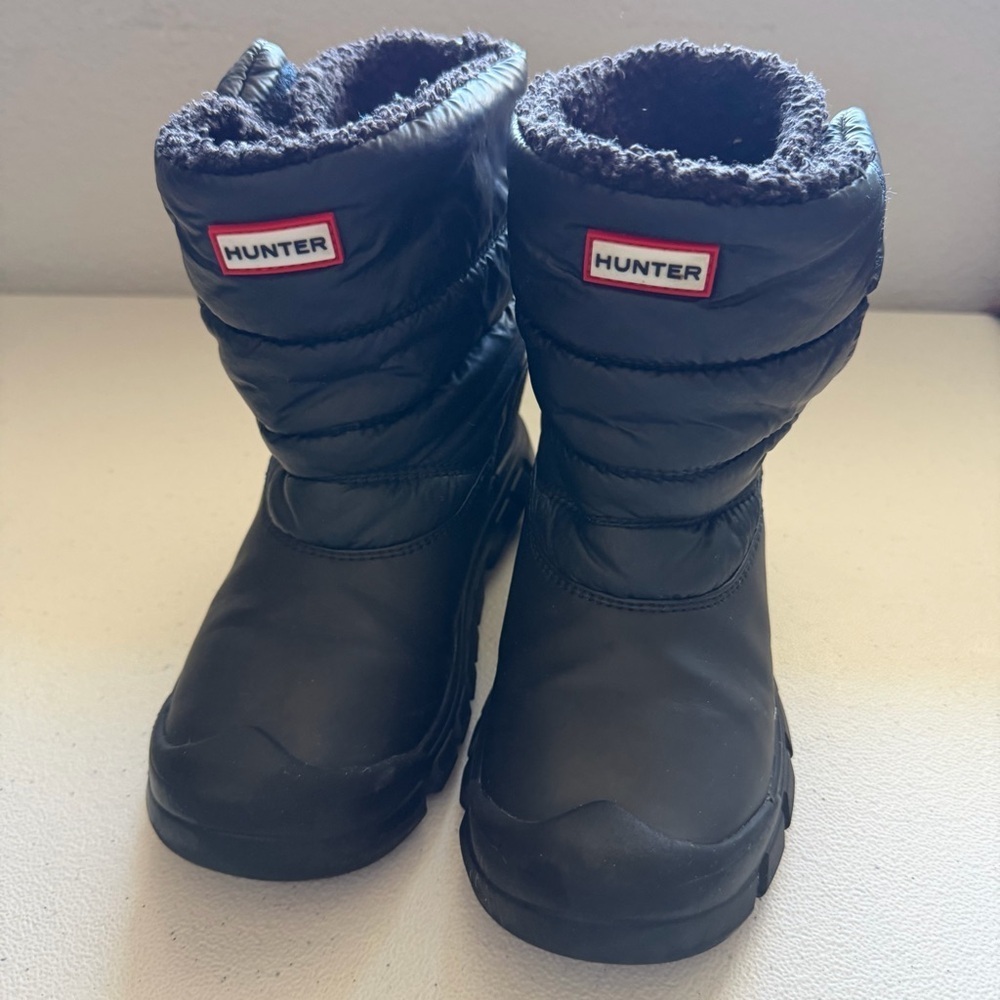 Hunter Kids' Intrepid Insulated Snow Boots in black.